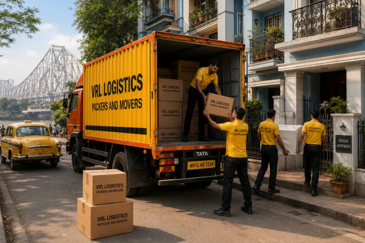 VRL Logistics Packers and Movers branded truck and team handling a relocation in Kolkata