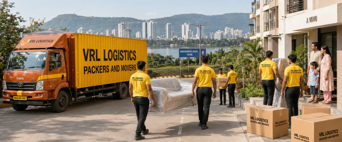 Packers and Movers in Thane — VRL Logistics team loading a branded moving truck for a household relocation